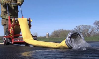 RollnRack with DA Operational Video Overlay RollnRack with DA in use draining water from a hose